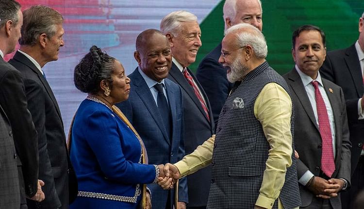 Indian Prime Minster Narendra Modi is greeted by U.S. Rep. Sheila Jackson Lee (D-TX) onstage at NRG Stadium during a rally on September 22, 2019 in Houston, Texas. The rally demonstrated that both Democrats and Republicans value the Indian vote and will walk the extra mile to try and grab it.  Does the race to the White House really matter for India Inc Does the race to the White House really matter for India Inc