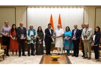 Manoj Ladwa & other dignitaries presenting the book to Prime Minister Narendra Modi